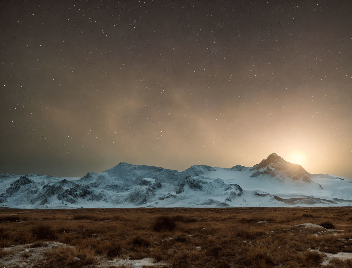 Snowy Mountain Range Sunset with Starry Sky and Barren Foreground