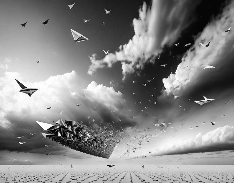 Monochrome paper planes flying in cloudy sky