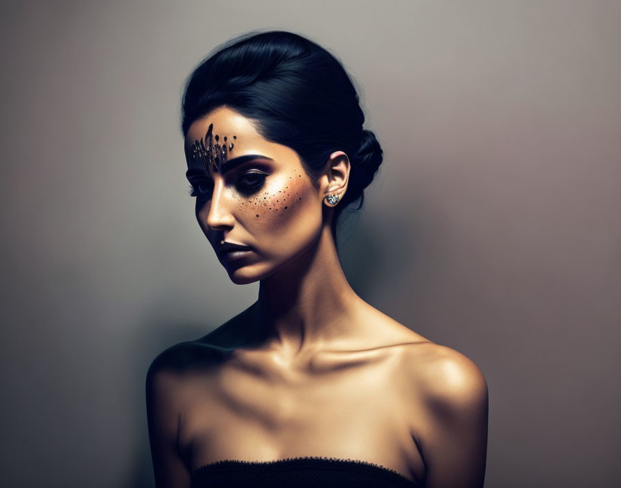 Striking side profile of a woman with detailed makeup and elegant attire