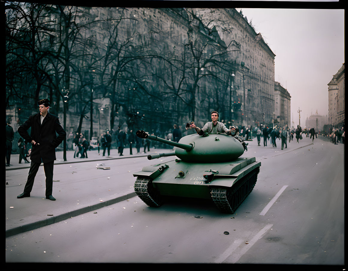 Historical photograph of military tank in city street with people around