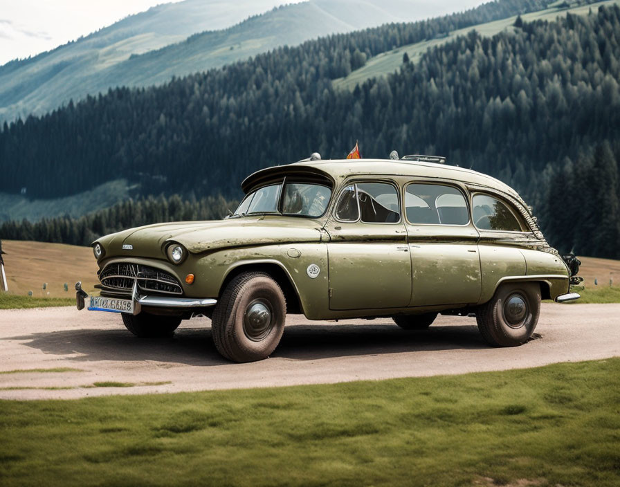 Vintage Green Station Wagon on Gravel Road with Forested Hill and Cloudy Sky