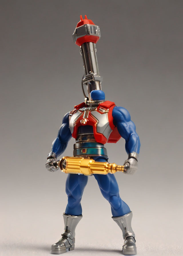 Blue and Red Costume Action Figure with Silver Helmet and Staff