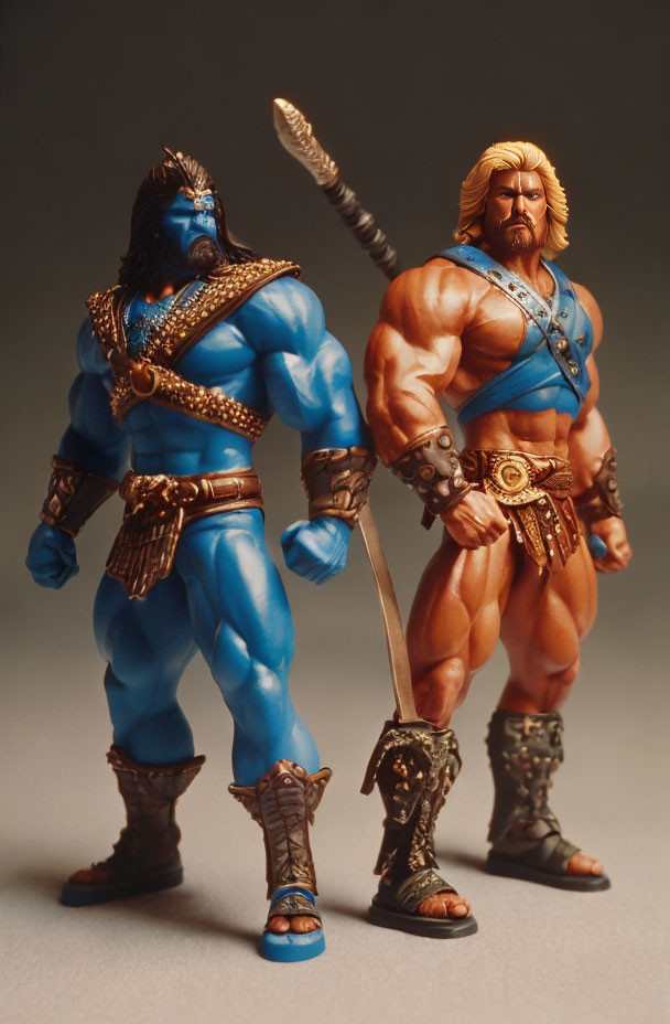Fantasy-themed warrior action figures with swords and blue/tan skin.