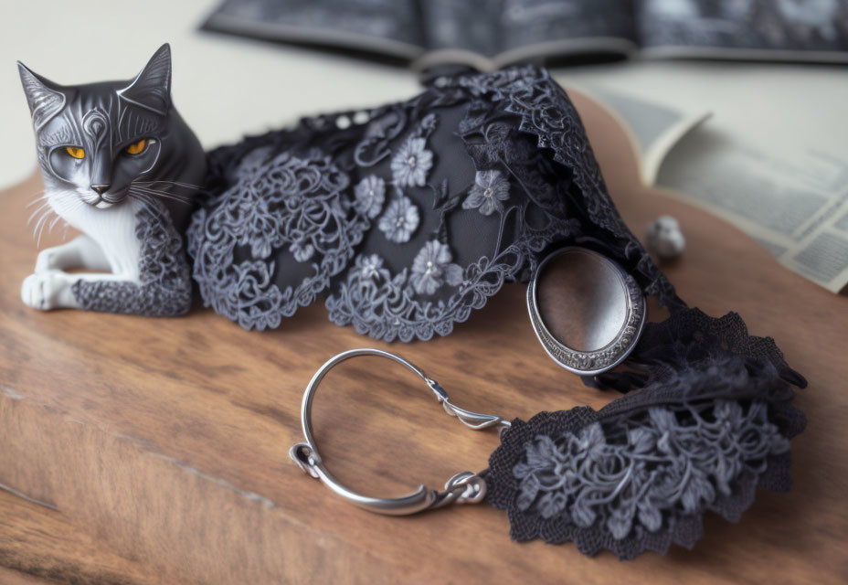 Grey and White Cat with Black Parasol, Silver Ring, and Garter on Wooden Surface