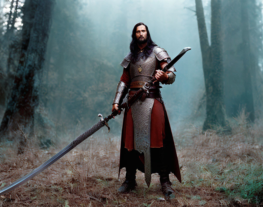 Medieval warrior in armor with sword in misty forest