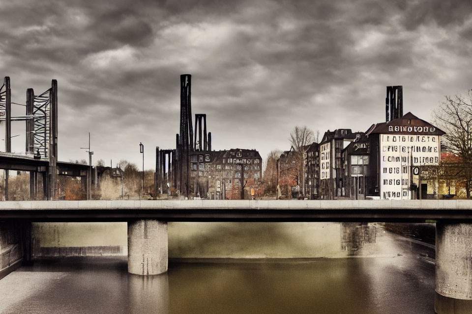 Cityscape with Bridge and Industrial Buildings Under Overcast Sky