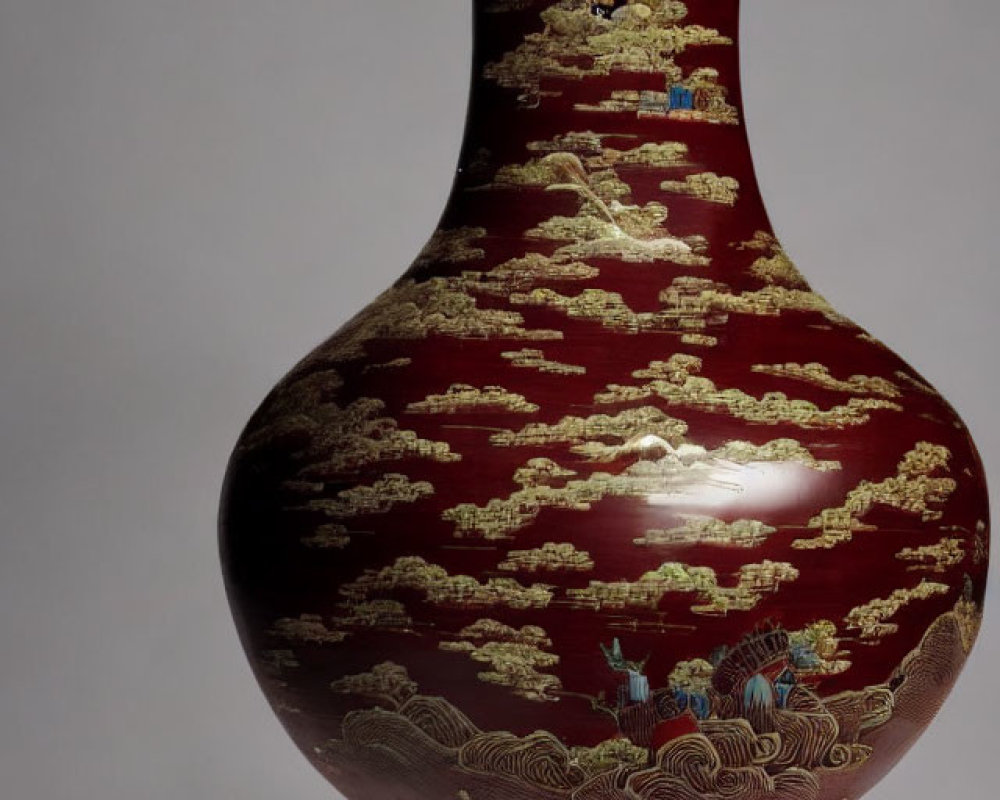 Traditional Chinese Red Vase with Gold-Painted Clouds and Landscape Design