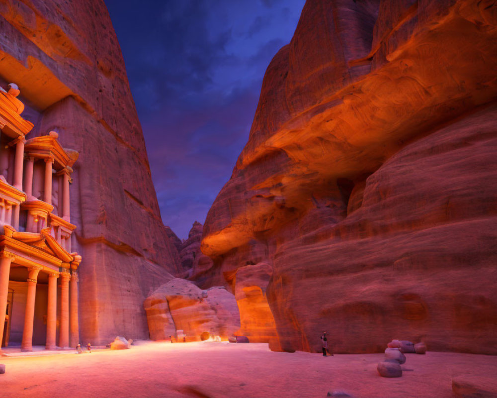 Ancient rock-cut architecture of Petra at twilight with blue sky and red stone