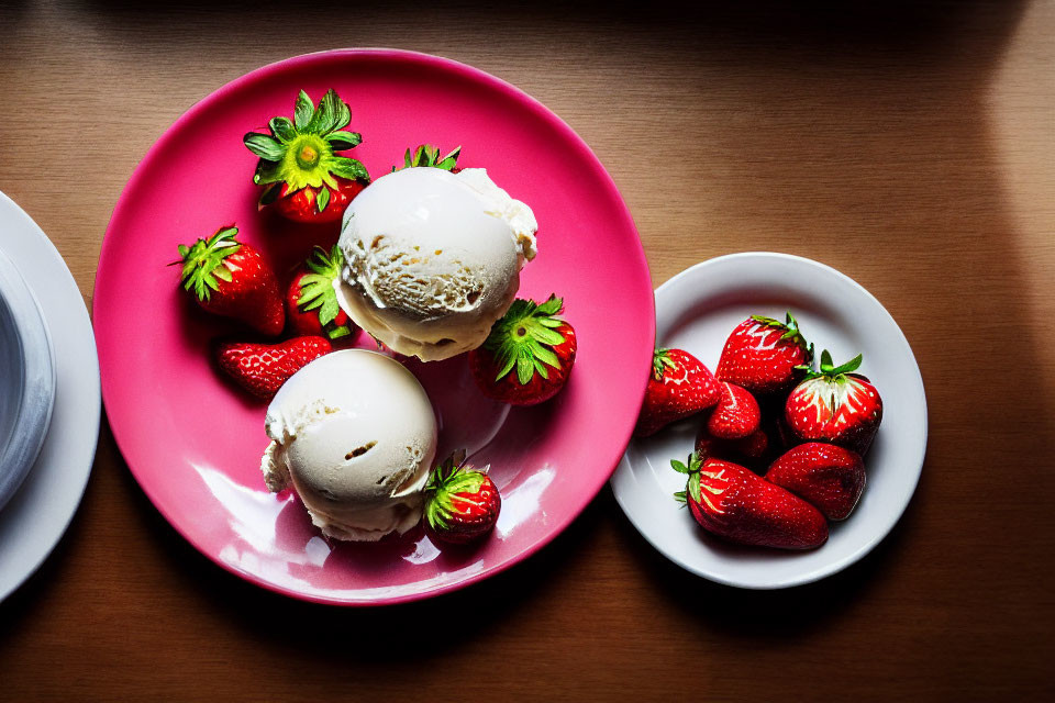 Vanilla Ice Cream Scoops with Fresh Strawberries on Pink Plate