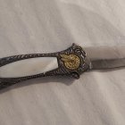 Golden Sword with Intricate Metalwork & Precious Gems