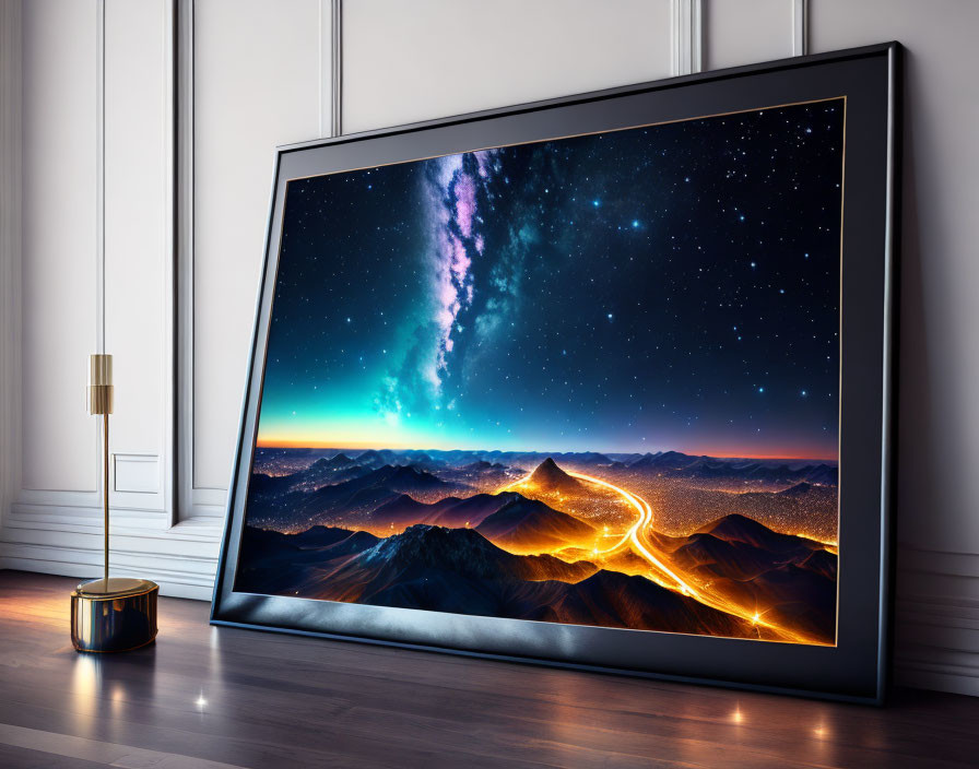 Large framed TV showing vibrant night landscape with starry sky and winding road through mountains in modern room with