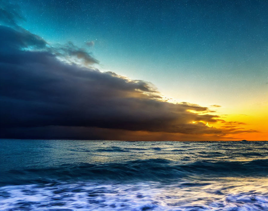 Dramatic seascape at dusk with dark cloud, vibrant sunset, and emerging stars