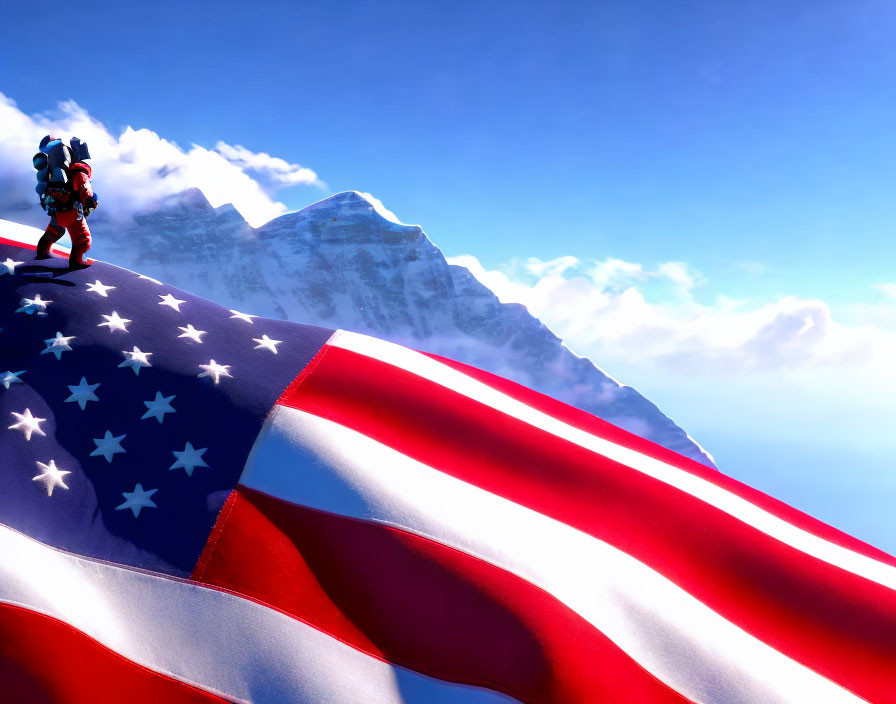 Astronaut with U.S. flag before snow-covered mountain under blue sky