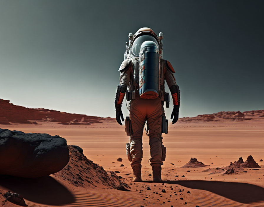 Astronaut in spacesuit on Martian-like landscape with rocks and sand under reddish sky