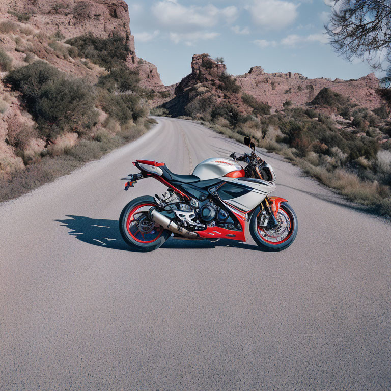 Red and White Sports Motorcycle on Deserted Road with Rocky Terrain