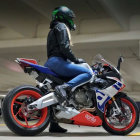 Digital artwork: Woman in helmet and leather jacket on futuristic sport motorcycle
