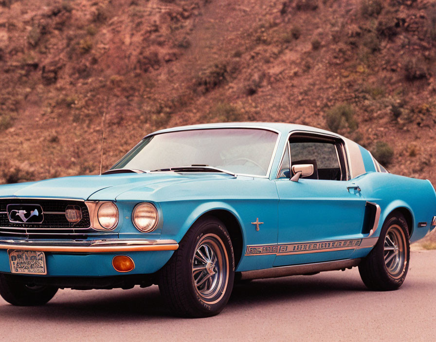 Vintage Blue Ford Mustang with White Stripes on Asphalt Road