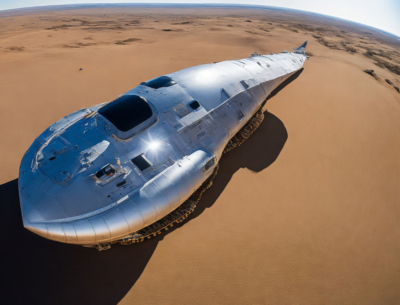 Desert landscape: Abandoned airplane in sand.