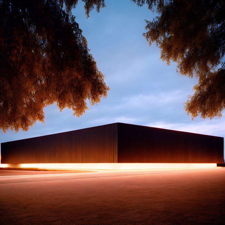 Minimalist Black Building Illuminated by Warm Light Against Twilight Sky