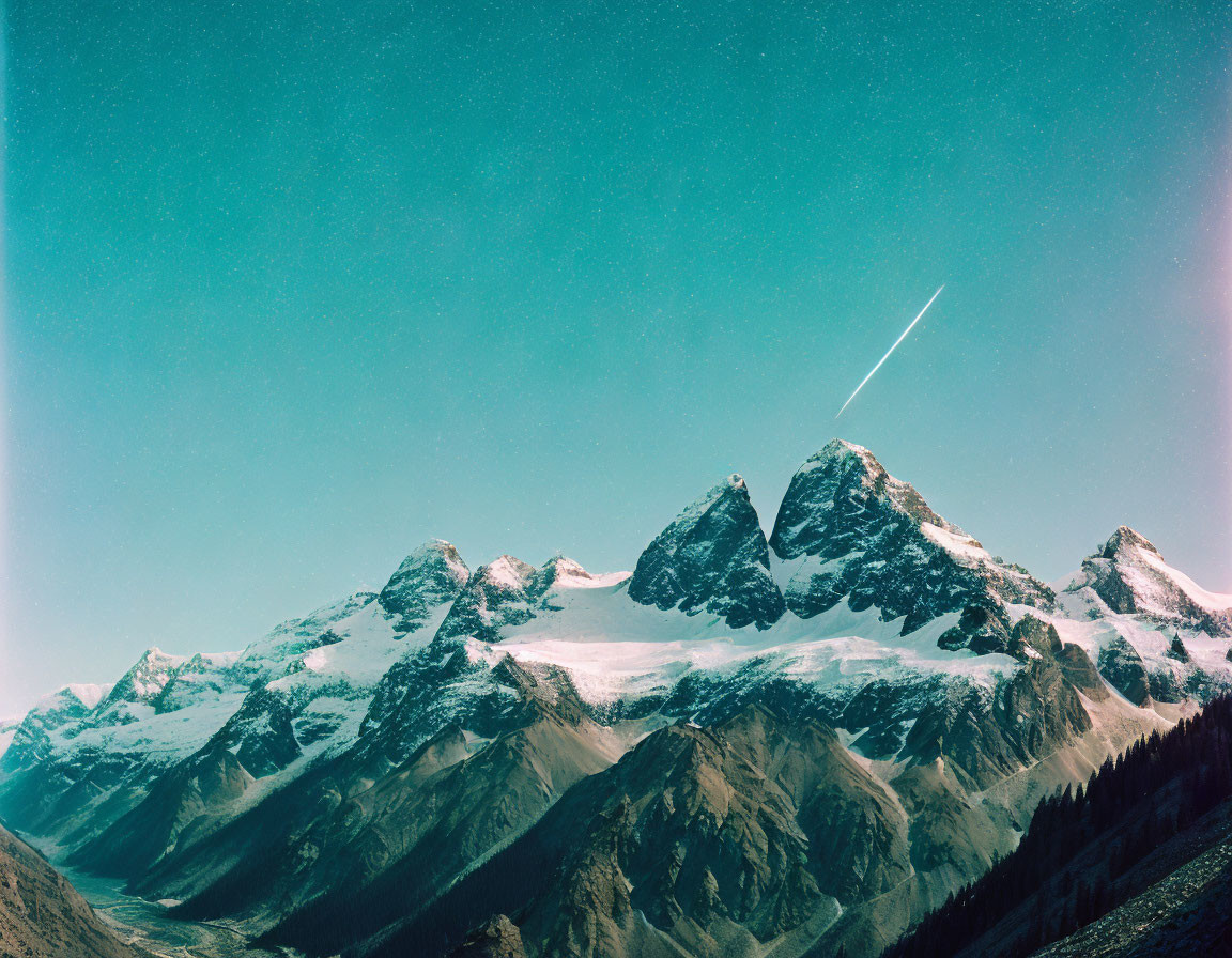 Snow-capped Mountain Peaks under Teal Sky with Shooting Star