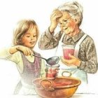 Family bonding: grandmother and granddaughter making drink with oranges