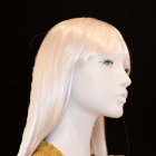 Realistic female mannequin with blonde hair on black background