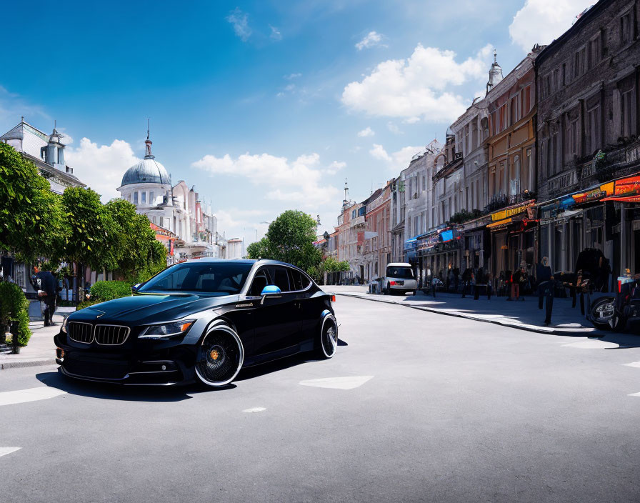 Luxury Black Car Parked on Sunny European Street