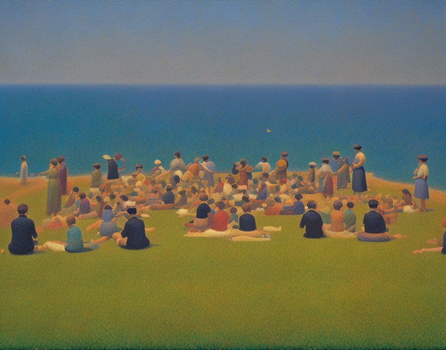 Group of People Relaxing on Grass Field by the Sea Under Blue Sky
