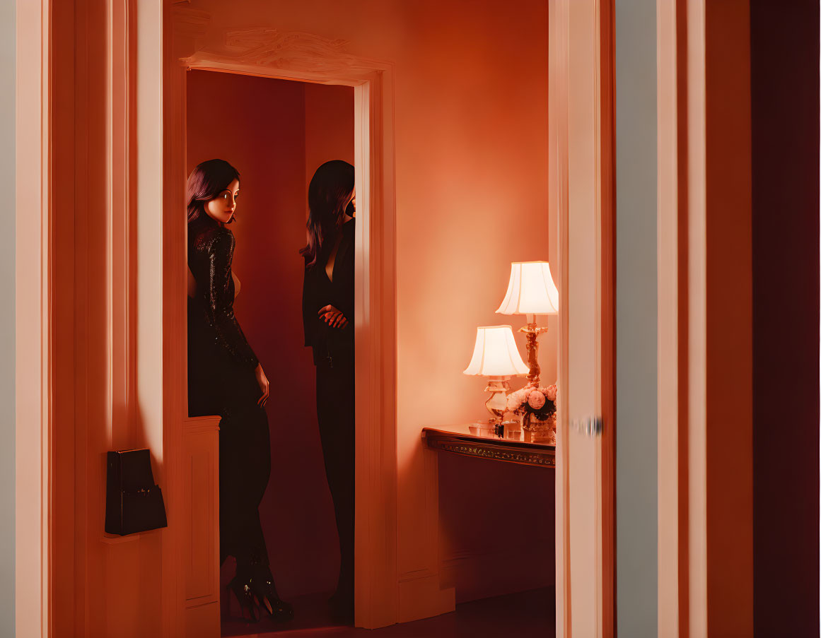 Woman in Black Dress Standing in Doorway with Warm Red Light and Table Lamp