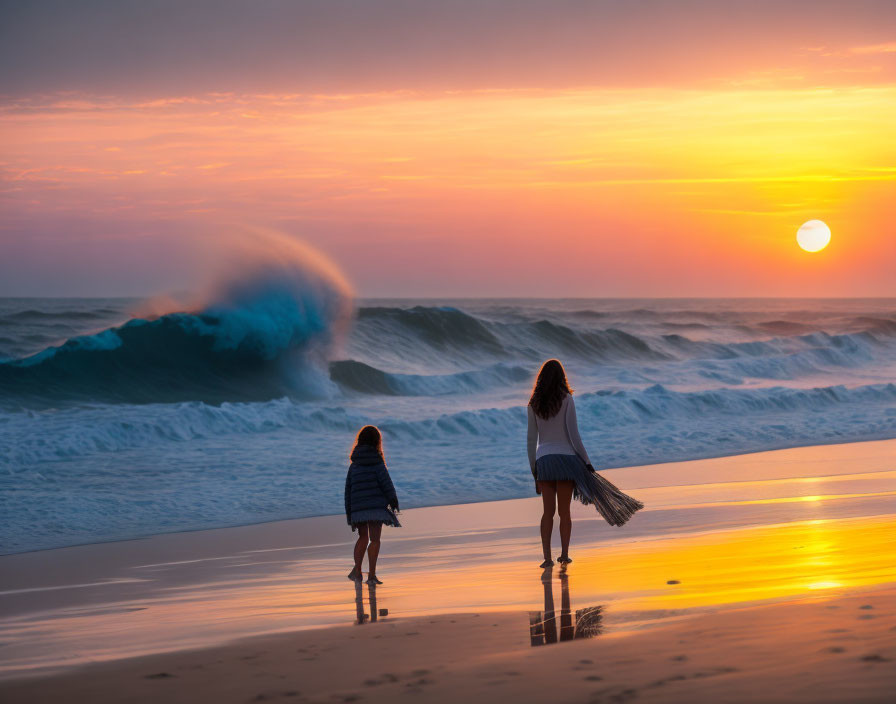 Beach scene: Two people watching sunset wave