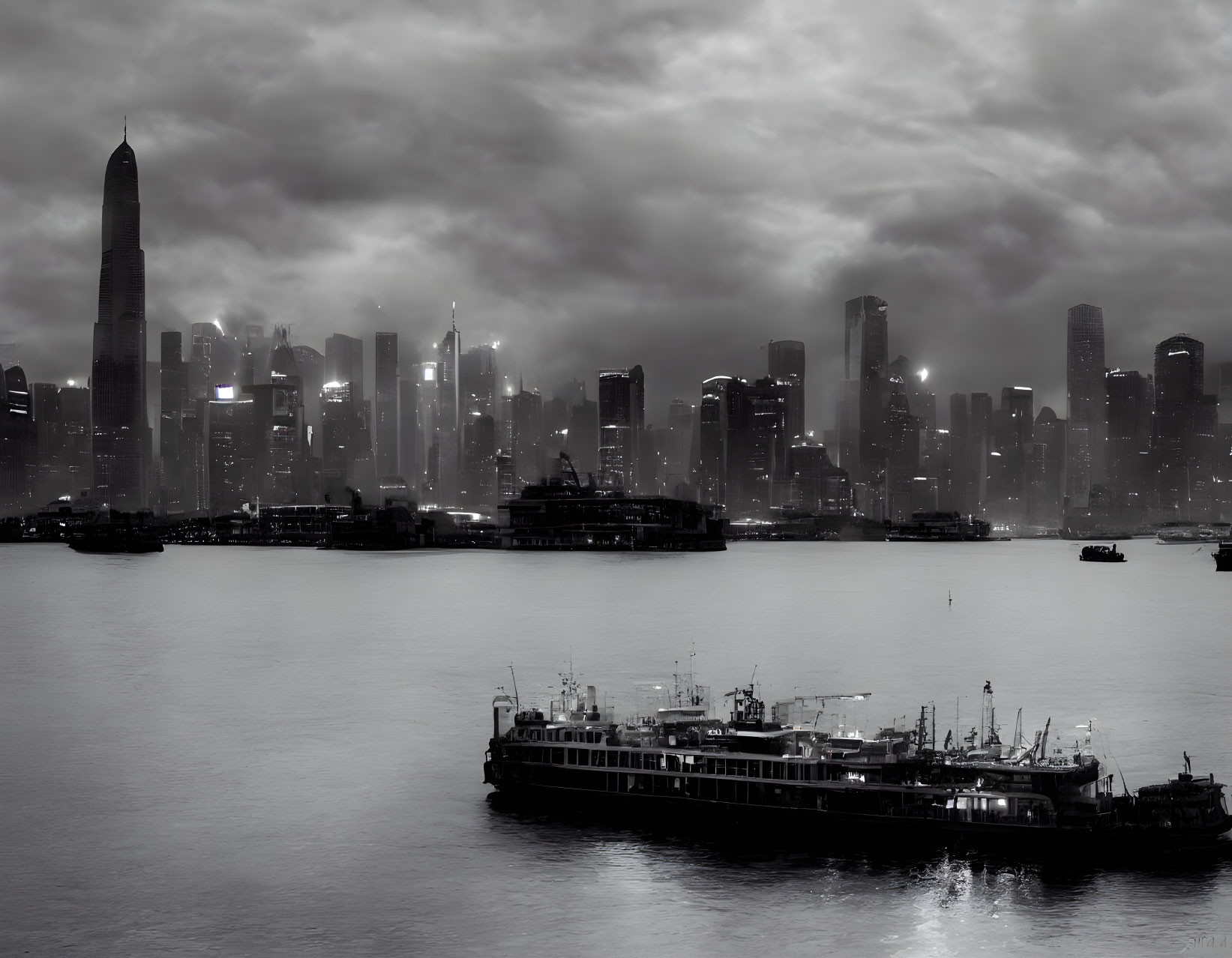 Monochrome cityscape at dusk with illuminated skyscrapers and ferry on river