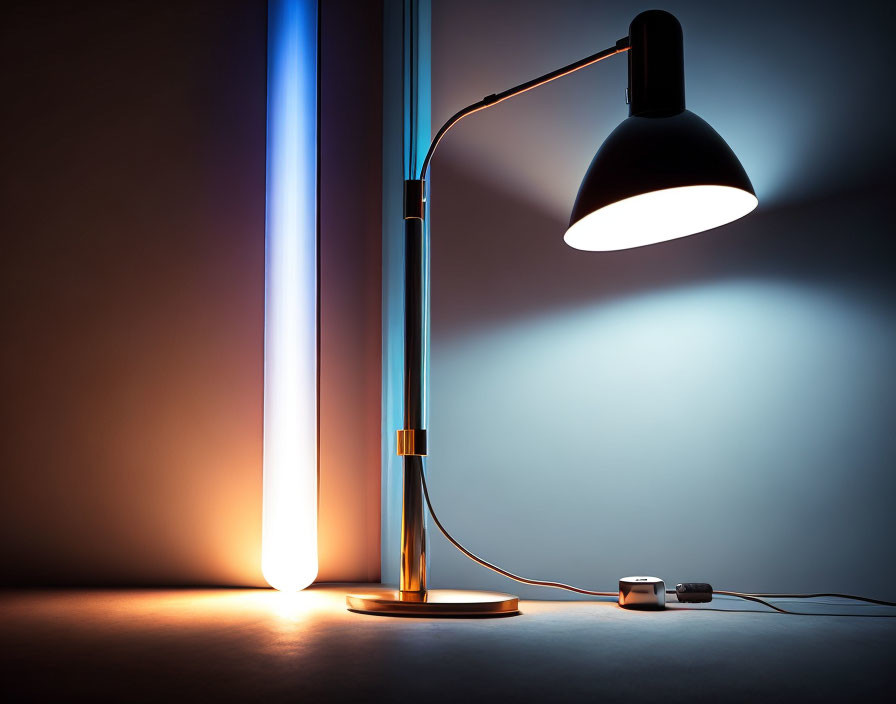 Contemporary Black and Gold Desk Lamp with Blue Light Bar on Gradient Wall