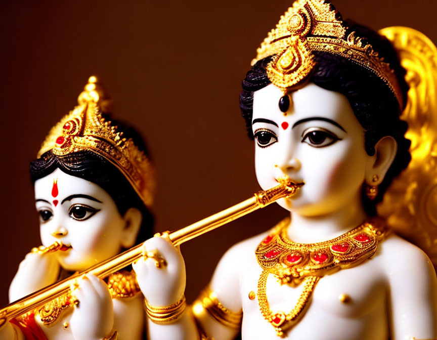 Hindu Deity Figurines with Flute and Gold Adornments