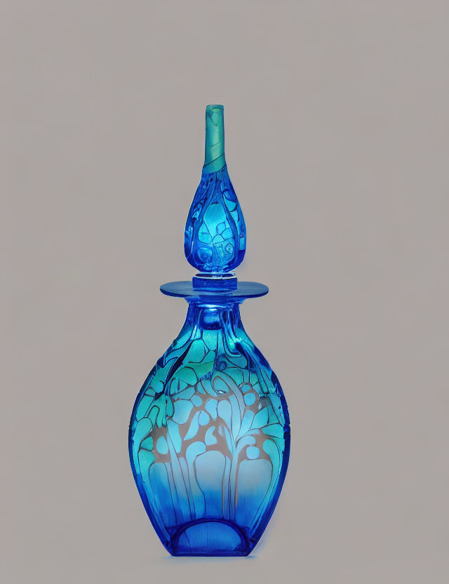 Blue Glass Decanter with White Floral Patterns on Beige Background