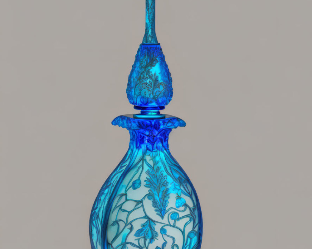 Blue Glass Perfume Bottle with Floral Patterns and Pointed Stopper