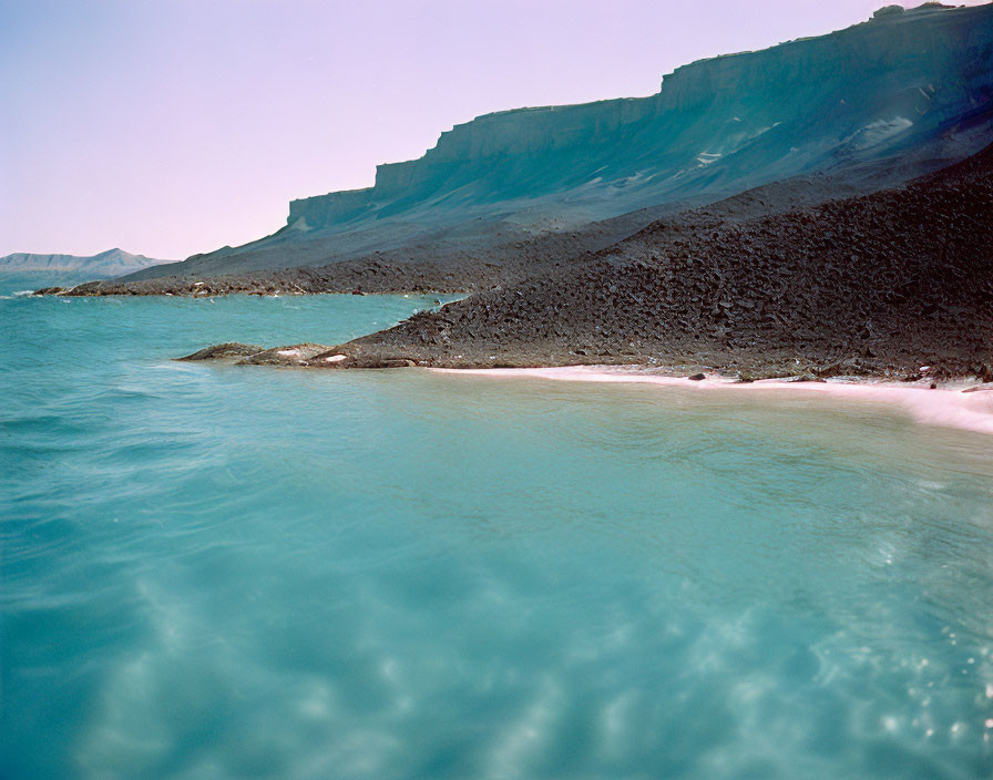 Turquoise Sea, Black Pebble Beach, Stark Cliffs, Blue Sky