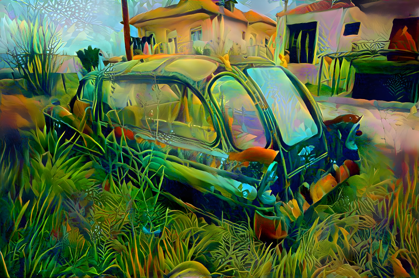 Old hearse abandoned in overgrown junly weeds