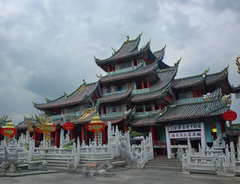 Traditional Chinese Temple with Pagoda-Style Roofs and Ornate Carvings