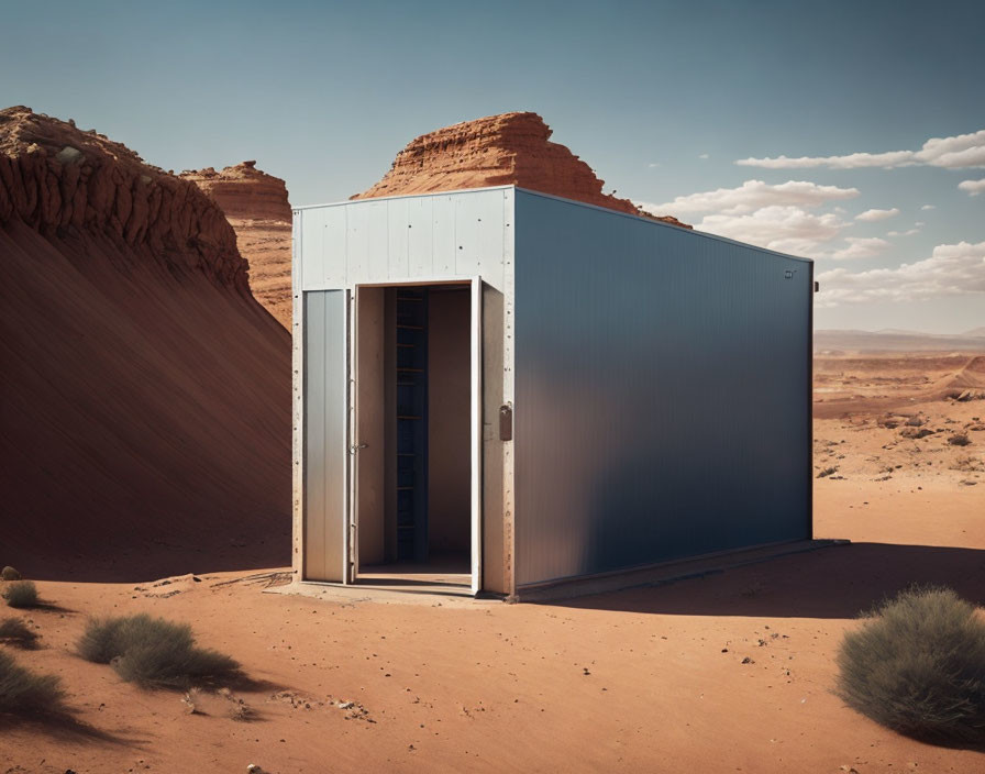 Isolated metal storage container in sandy desert landscape