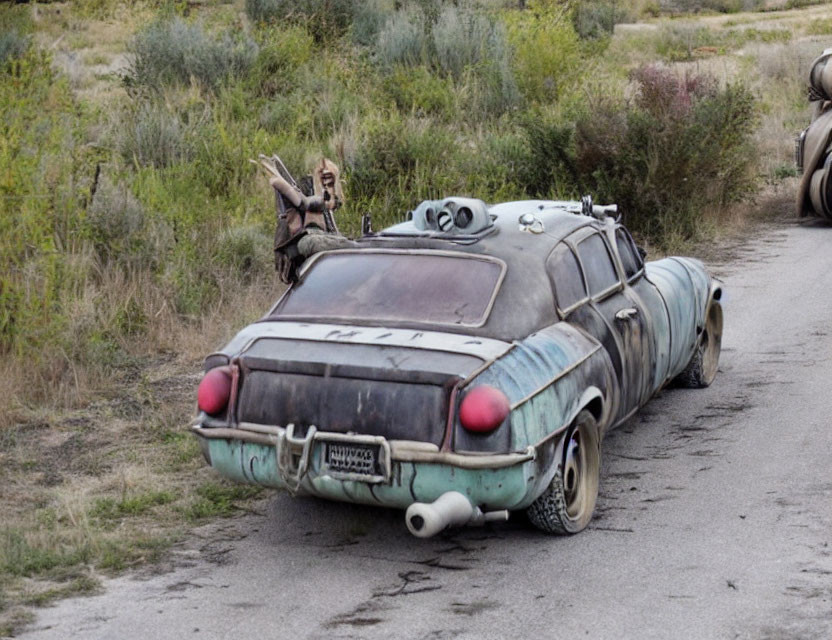 Vintage car with quirky modifications parked on dirt road