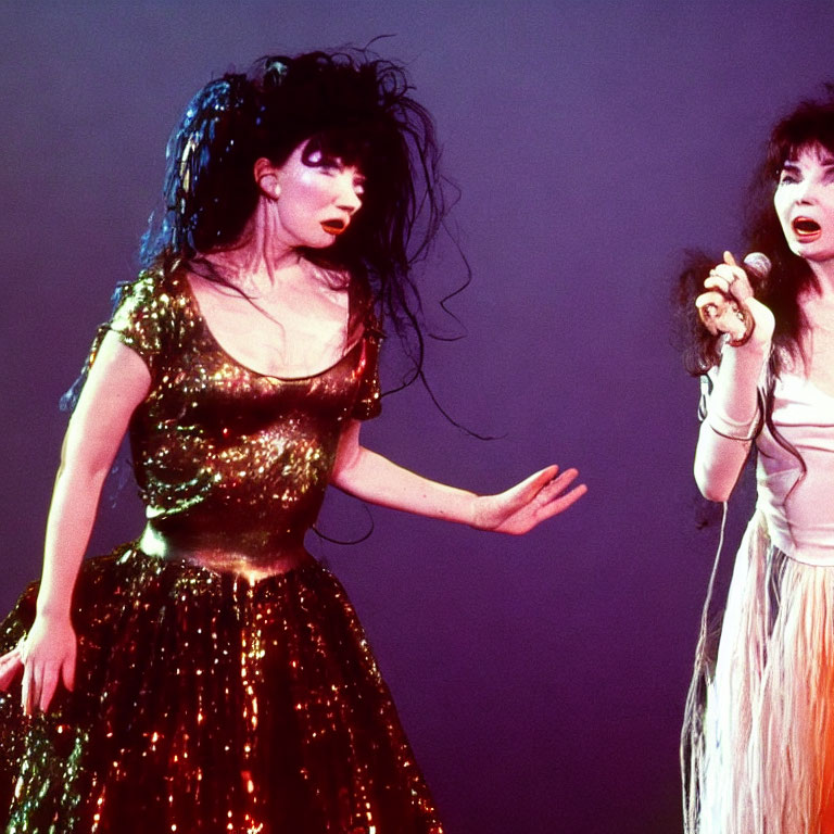 Dramatic makeup and flamboyant costumes on two singers performing on stage
