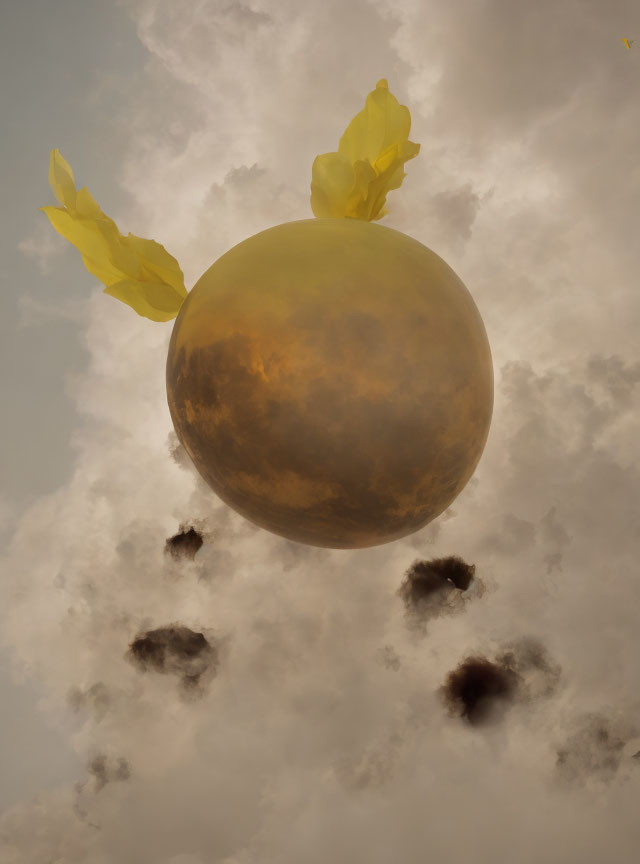 Golden apple with yellow leaves in cloudy sky over shadowy spots