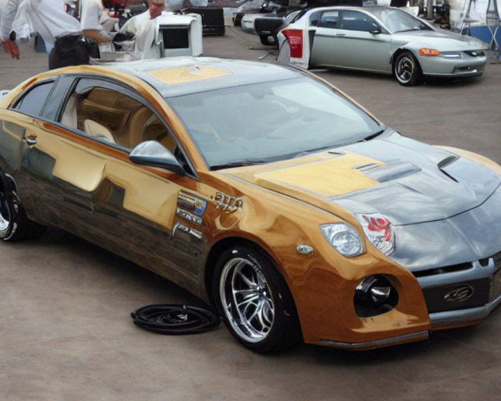 Glossy Gold and Black Custom Car with Large Wheels and Body Modifications