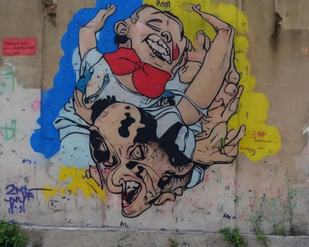 Colorful graffiti mural of child on adult's shoulders with exaggerated faces among tags