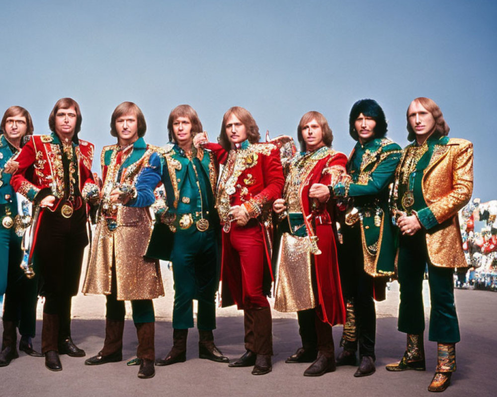 Seven individuals in colorful military-style band uniforms against blue sky