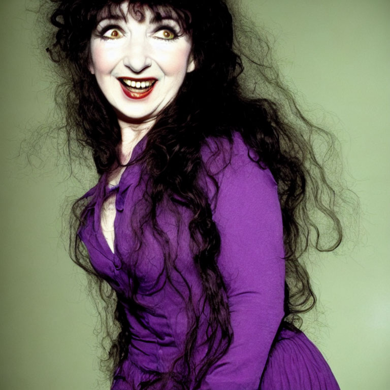 Curly Black Hair Woman Smiling in Purple Dress