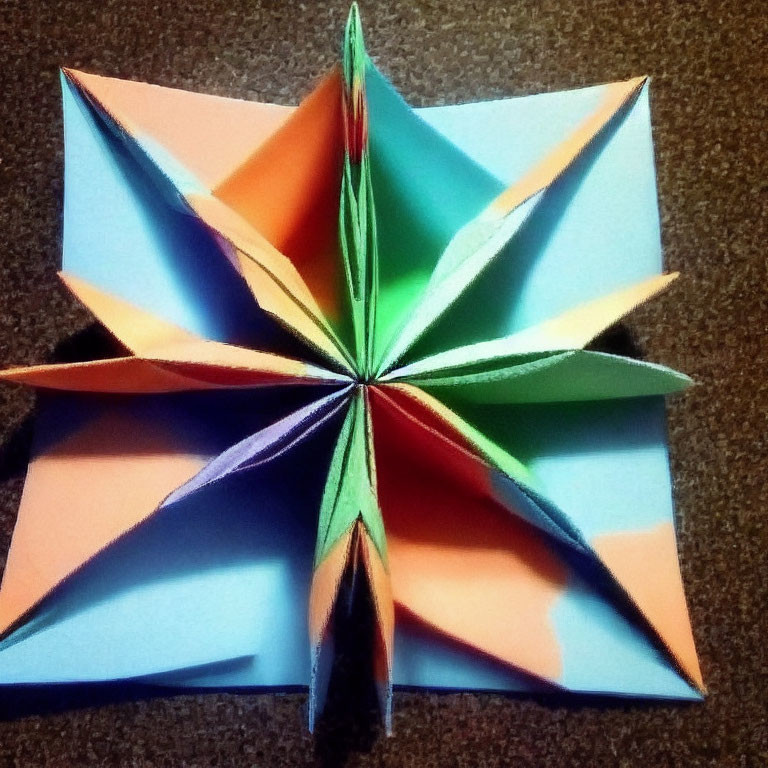 Symmetrical Modular Origami Star in Blue, Green, Orange, Purple
