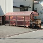 Vintage Pink Trailer with Patio Chairs in Desert Setting