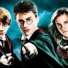 Animated young wizards casting spells with wands in school uniforms and scarves