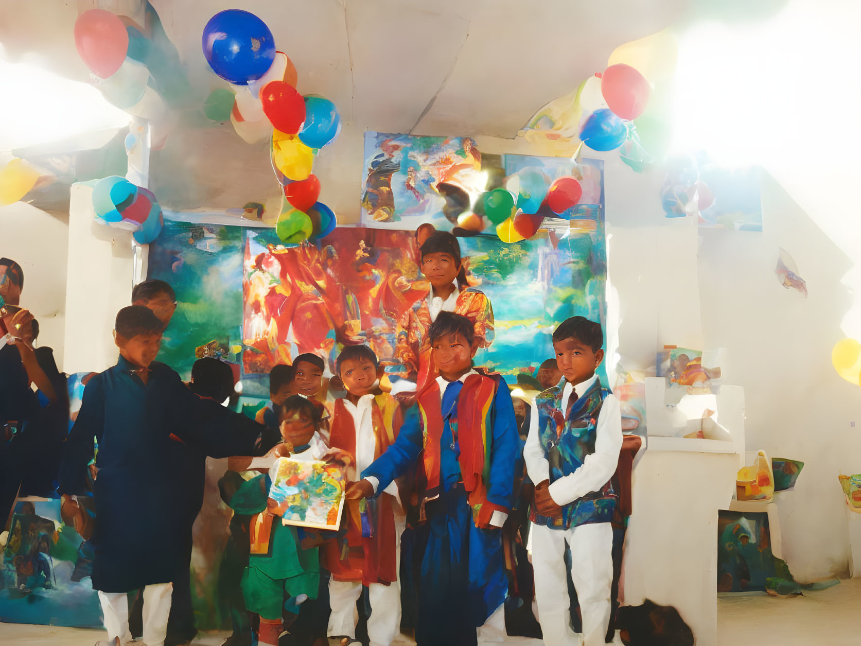 Children in festive clothes at party with balloons and colorful decorations